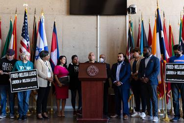 Sylvia Collins holds John Lucio's hand as they pray at a press conference at Dallas City Hall concerning the future of his mother, Melissa Lucio, who is on death row and scheduled to be executed on April 27, 2022. The family is traveling the state and joining state representatives and supporters in fighting for her freedom.